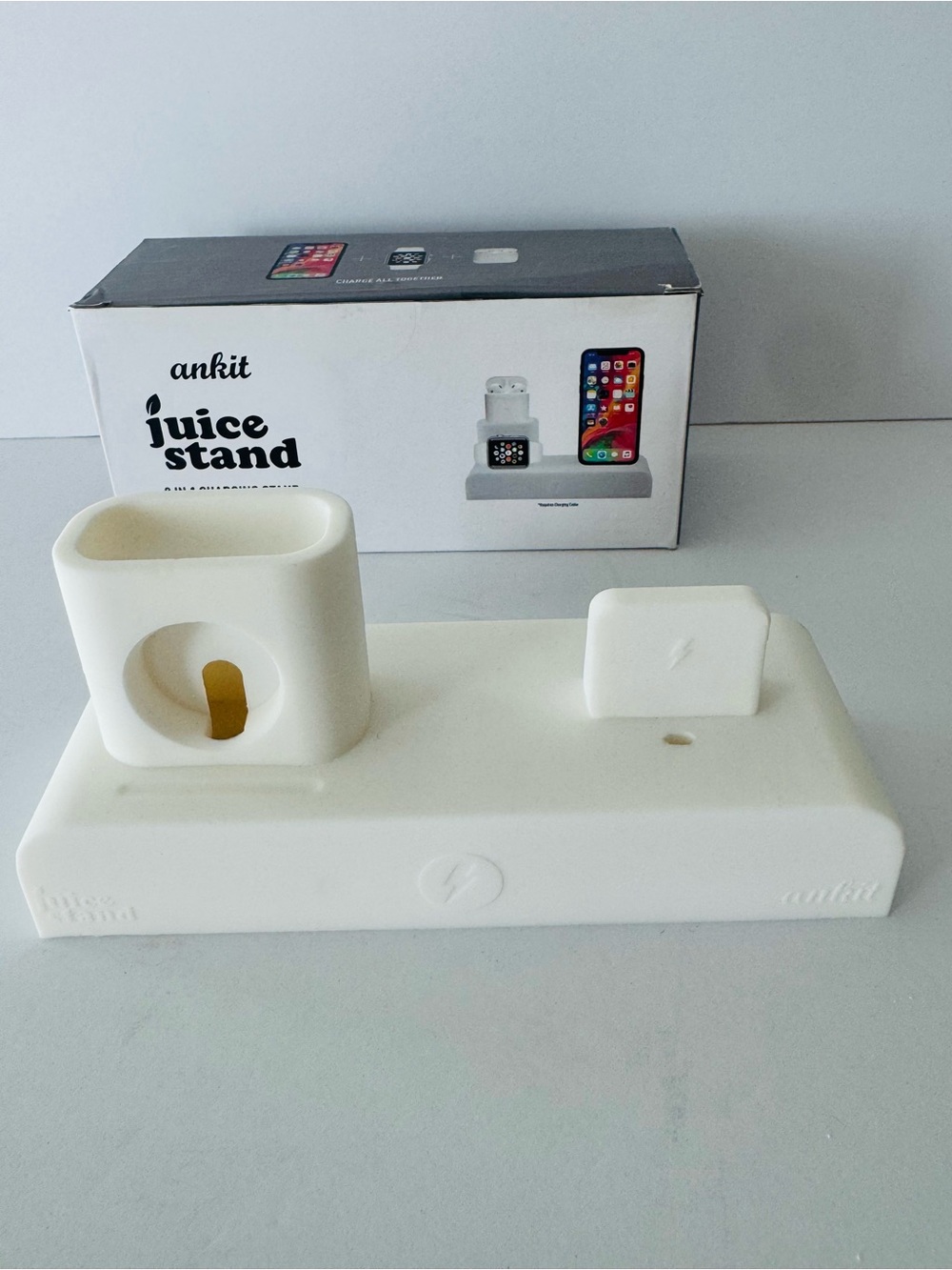 Brand new Ankit Juice Stand 3 in 1 charging dock silicone stand in white.